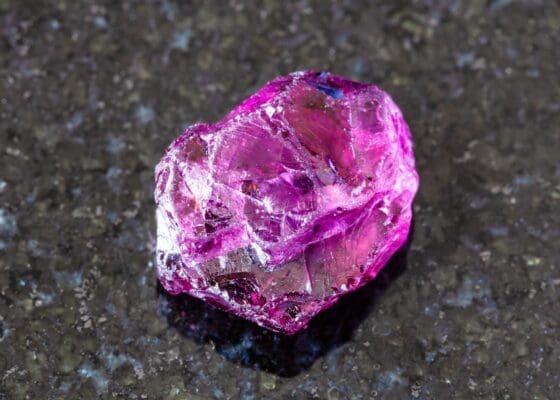 South Carolina Gem mining Rhodolite. A rose-red variety of garnet, this gemstone is often used in jewelry for its captivating color.